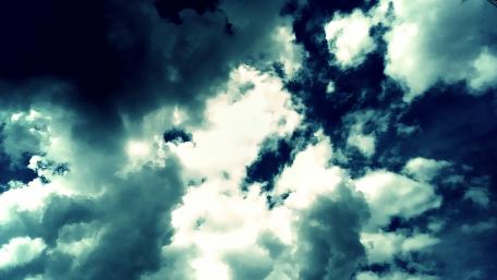 Dramatic Cumulus Clouds Overhead wallpaper