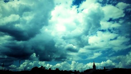City silhouette under the clouds wallpaper