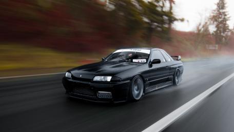 Black car on the road wallpaper