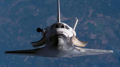 Majestic Space Shuttle in Orbit wallpaper