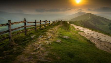 Sunrise Over Serene Highland Path wallpaper