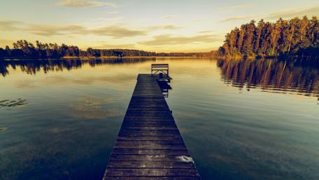 Long jetty above the calm lake wallpaper