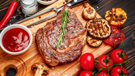 Sizzling Rib Eye Steak Delicacy wallpaper