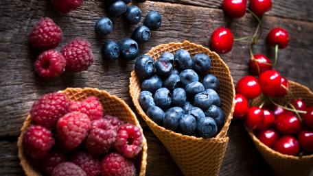 Raspberry, blueberry and cherry in cones wallpaper