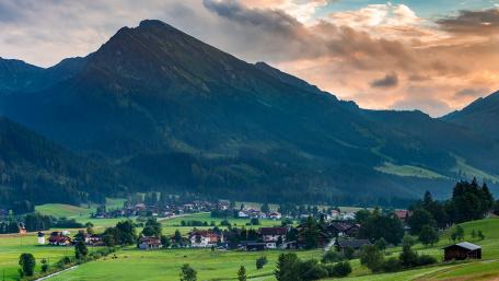 Serene Mountain Village Landscape in Nature's Embrace wallpaper