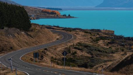 Serene Highway by the Turquoise Lake wallpaper