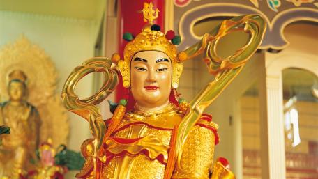 Golden Statue of Reverence and Serenity wallpaper