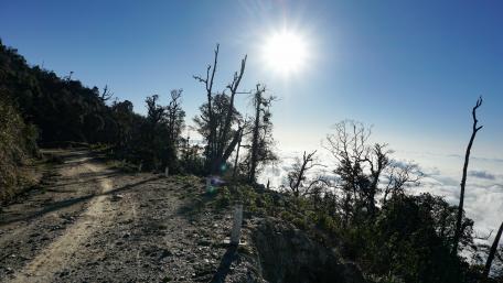 Dirt road above the clouds wallpaper