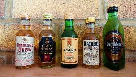 Whiskey bottles wallpaper