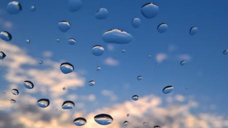 Crystal Clear Raindrops Against a Beautiful Sky wallpaper