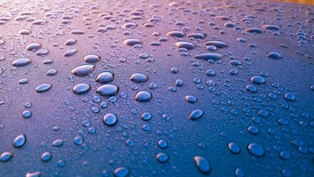 Water drops on a surface wallpaper