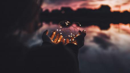 Holding Light in the Darkness wallpaper