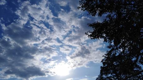 Serene Skies Above with Fluffy Clouds wallpaper