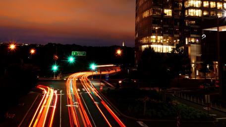 Vibrant Night Traffic in the City Lights wallpaper