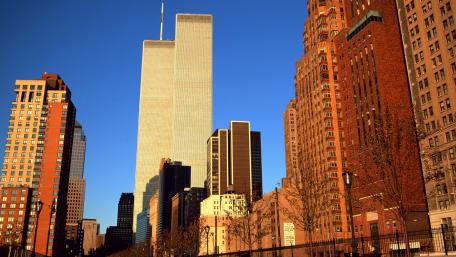 Urban Skyline Under Bright Blue Sky wallpaper