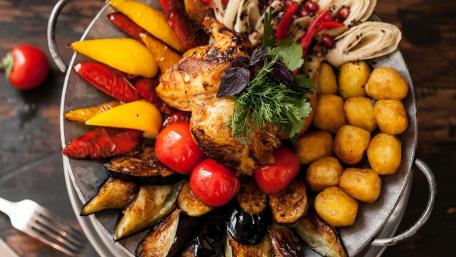 Grilled Vegetable Delight with Savory Chicken Dish wallpaper