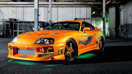 Toyota Supra with green neon lights wallpaper