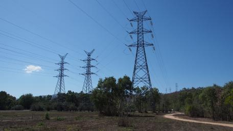 Skyward view of some Electrical Towers wallpaper