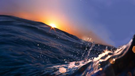 Waves in the sunset wallpaper