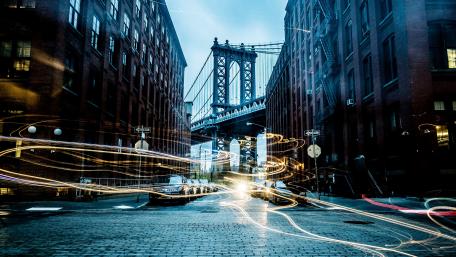 Manhattan Bridge with light trails wallpaper