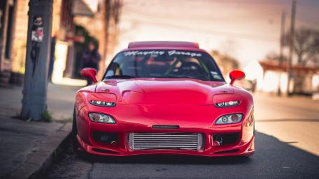 Sleek Red Mazda RX-7 Sports Car Wallpaper wallpaper