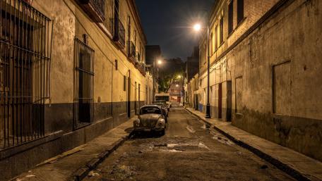 Old Volkswagen Beetle on the night street wallpaper