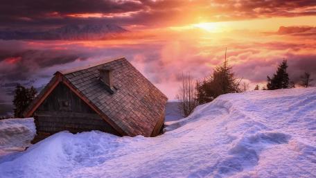 Winter Serenity at a Cozy Cabin wallpaper