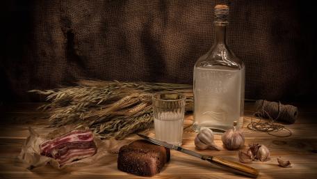 Rustic Still Life with Liqueur and Bacon Treats wallpaper