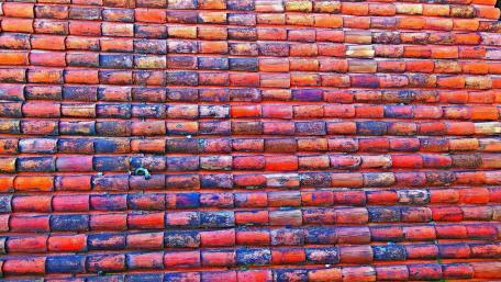 Vibrant Textured Brick Wall in Abstract Colors wallpaper