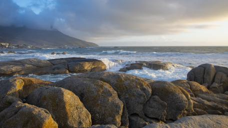 Serene Coastal Escape with Dramatic Skies wallpaper