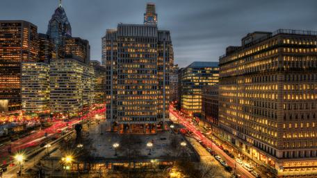 Vibrant Evening Cityscape Illuminated by City Lights wallpaper