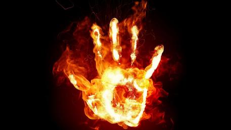 Hand on fire wallpaper