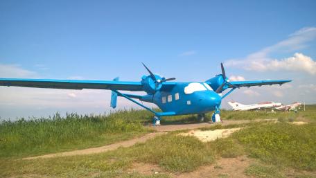 Vibrant Military Aircraft Against a Blue Sky wallpaper