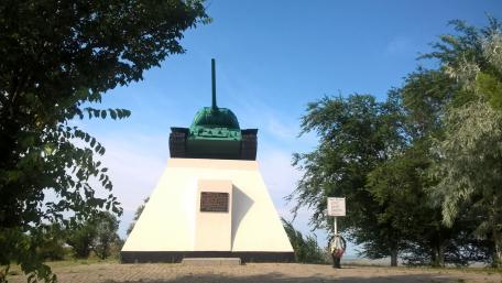 Tank Memorial in Peaceful Landscape wallpaper