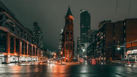 Urban Nightscape with Iconic Tower Scene wallpaper
