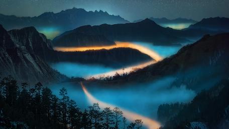 Mystical Foggy Twilight Valley wallpaper