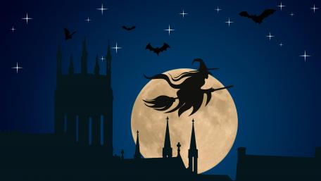 Witch flying on broomstick silhouette wallpaper