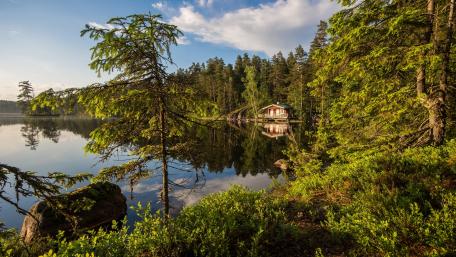 Lake with a cozy little house wallpaper