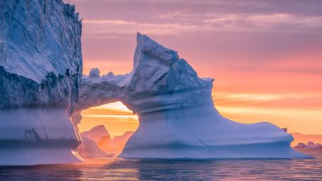 Majestic Iceberg at Dusk in the Arctic Sea wallpaper
