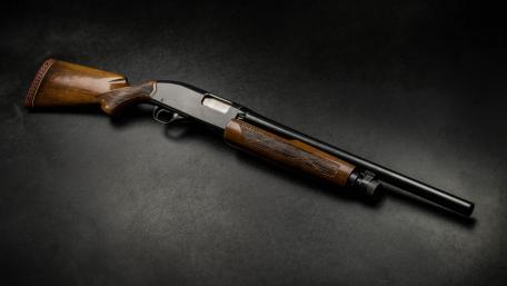 Vintage Rifle on Dark Backdrop wallpaper