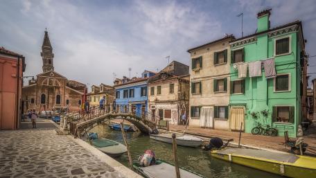 Charming Canal View of a Colorful Town wallpaper