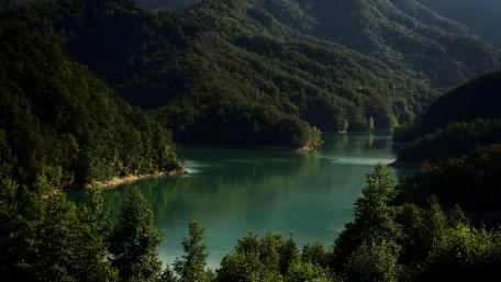 Tranquil Valley and Serene River View wallpaper