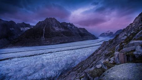 Majestic Mountains Under a Purple Sky wallpaper