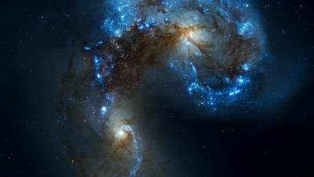 Galactic Dance in Cosmic Abyss wallpaper