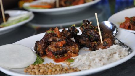 Savory Nepalese Dish Featuring Succulent Meat Delights wallpaper