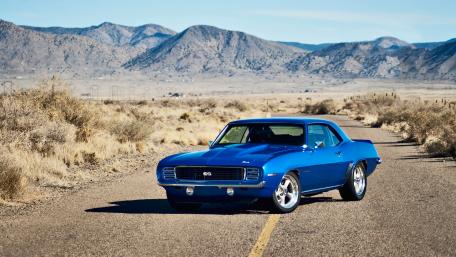 Classic Beauty of a Vintage Blue Sedan wallpaper