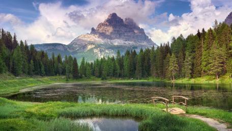 Tranquil Mountain Lake with Rustic Bridge wallpaper
