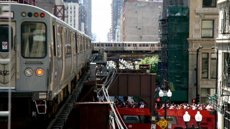 Urban Pulse of Chicago: Elevated Trains and Cityscape wallpaper