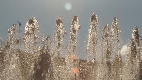 Dancing Water Jets in the Sunlight wallpaper