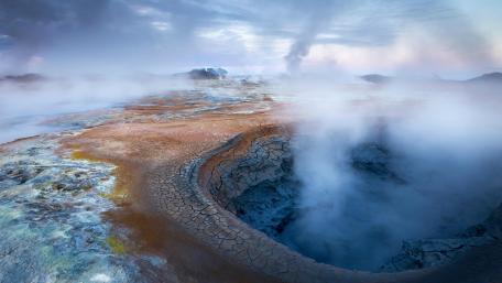 Misty Crater Landscape from Above wallpaper
